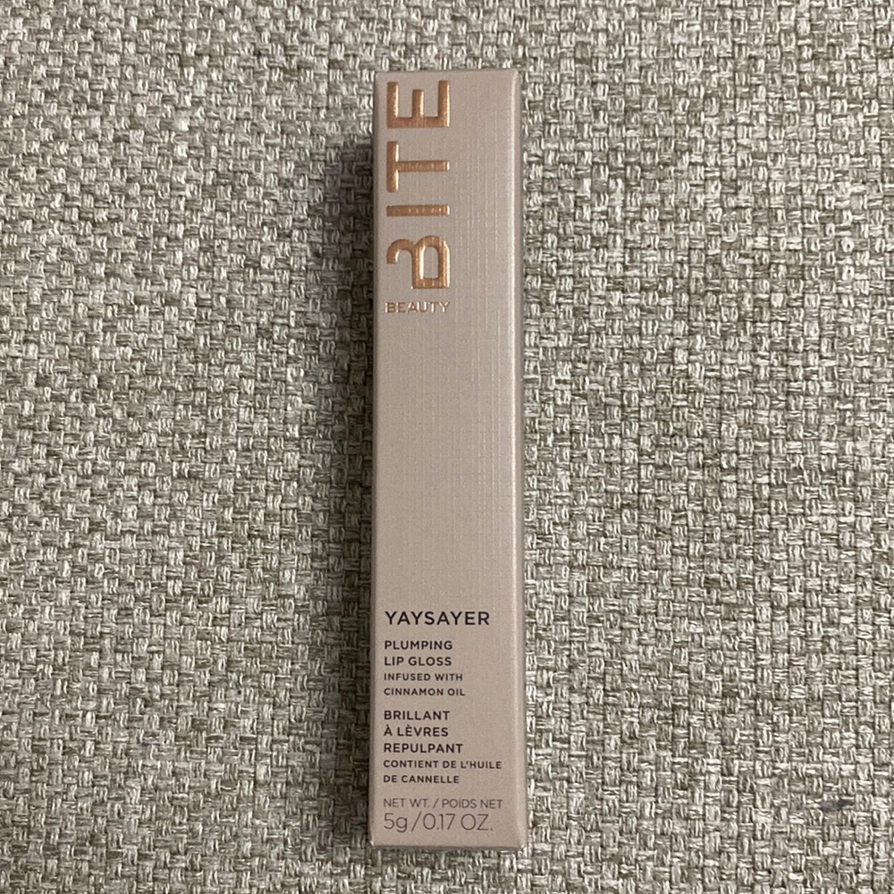 Bite beauty plumping limp gloss. Brand new.